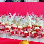 Hart skewers at the Pennsic Knowne World Courtesans Social on August 10, 2017 Sausage, cherry tomatoes, and cheese held together with skewers with stag heads at one end